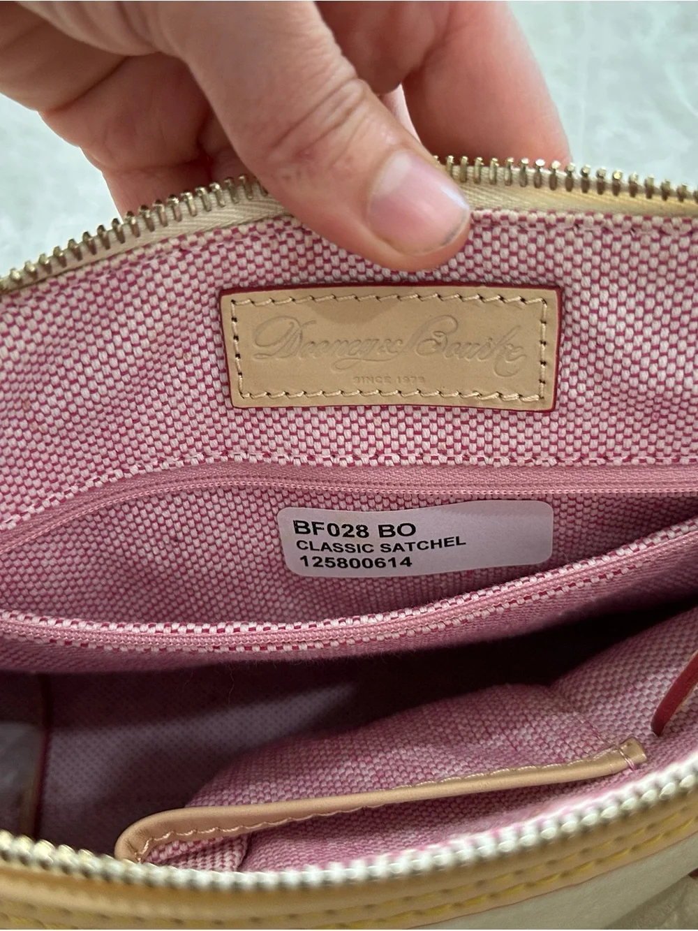 Dooney & Bourke Cream Leather Satchel with Tan Trim and Navy Tag Accent